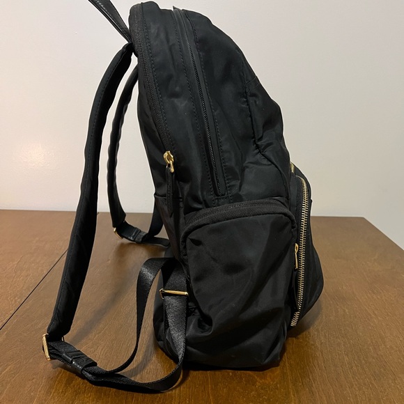 Tumi Black Backpack with Gold Details
